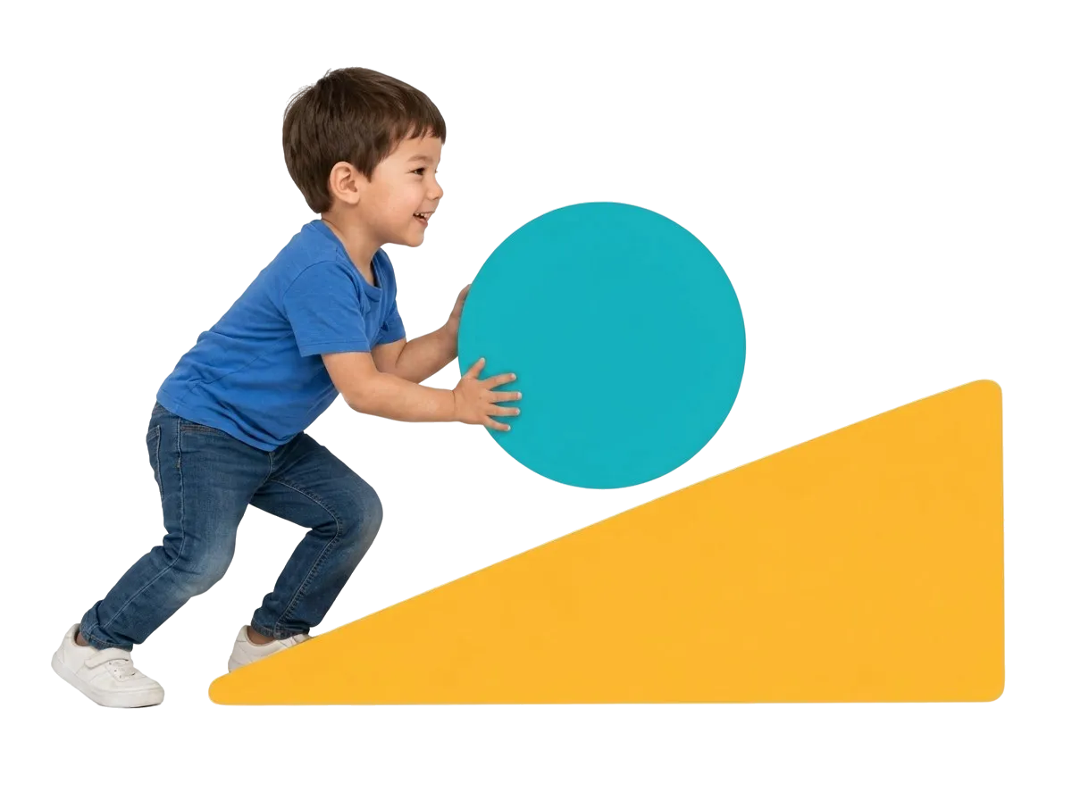 Boy pushing a turquoise ball up a yellow ramp